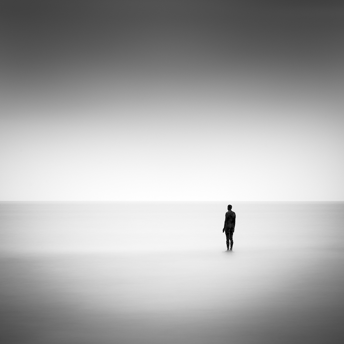 Antony Gormley sculpture in the sea at Knokke