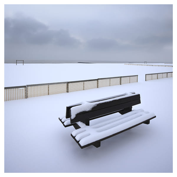 Snow-covered bench in Knokke