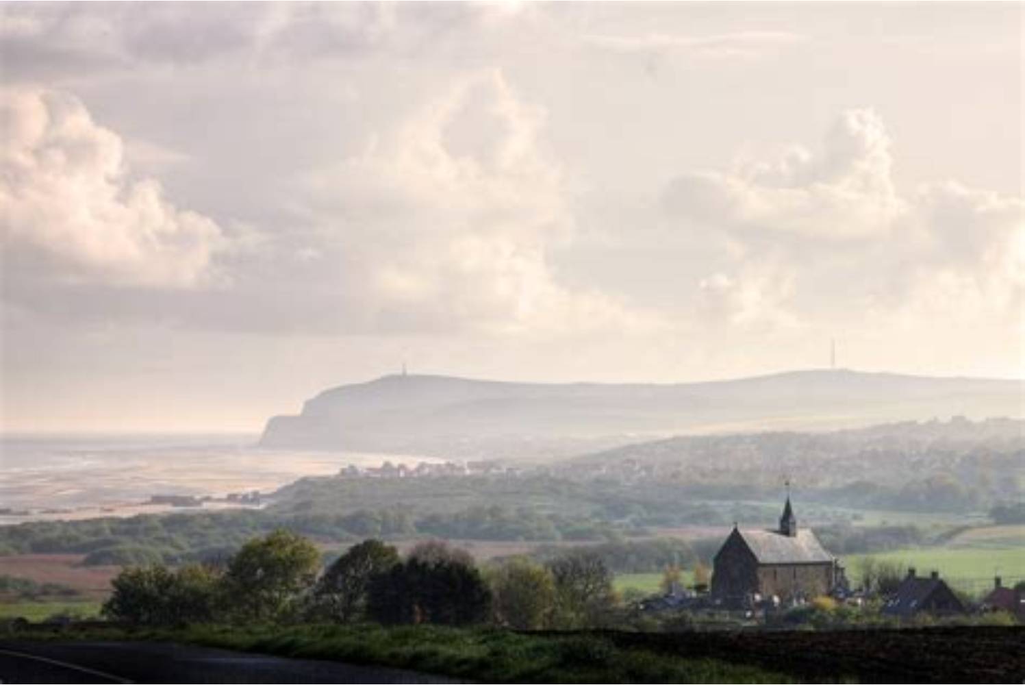 Coastal landscape with a village church